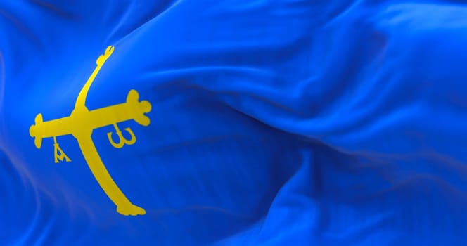 The Asturias flag waving. Autonomous community in northern Spain. Blue with golden victory cross shifted towards the hoist side. Selective focus. 3d illustration render. Close-up. Textured background