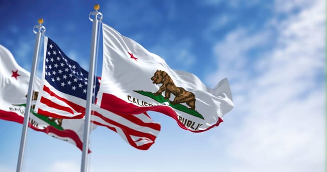 The California Republic state flag waving along with the national flag of the United States of America on a clear day. 3D illustration render. Rippled textile