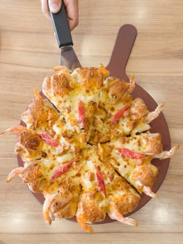 International franchise restaurant chain offers styles of pizza, stock photo