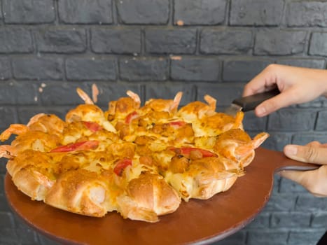 International franchise restaurant chain offers styles of pizza, stock photo