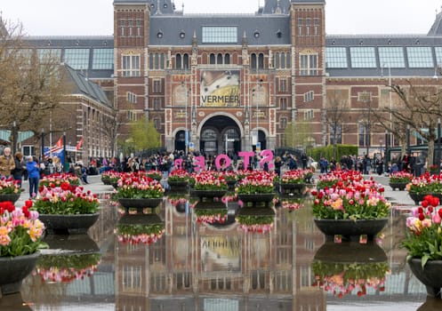 Amsterdam, Netherlands - April 21, 2023: The Rijksmuseum in Amsterdam - the largest exhibition on Dutch painter Johannes Vermeer ever - displaying 28 of his masterpieces