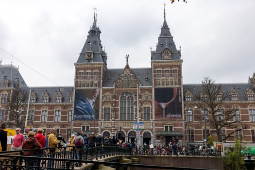 Amsterdam, Netherlands - April 21, 2023: The Rijksmuseum in Amsterdam - the largest exhibition on Dutch painter Johannes Vermeer ever - displaying 28 of his masterpieces