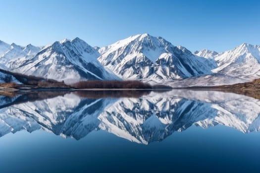 Enjoy the breathtaking view of snow-capped mountains towering over a calm lake, reflecting the surrounding landscape. The sharp focus and panoramic perspective of this stunning landscape make it a must-have for landscape photography enthusiasts. (generative AI)