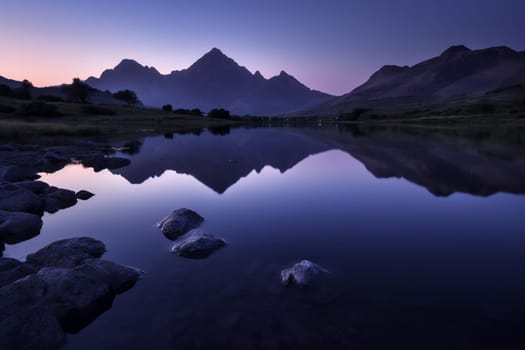 As the sun sets, it bathes the sky in a spectrum of colors, casting a peaceful and mystical light over the serene lake below. The towering mountains surrounding the lake create a breathtaking backdrop, creating a sense of perspective and scale unmatched in other settings. This scene embodies tranquility and serenity, transporting the viewer to a state of inner peace. (generative AI)