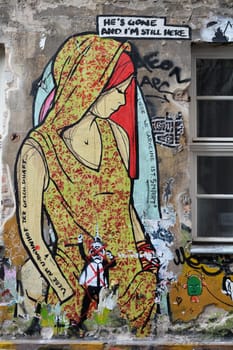 Street art on the facade of a house in Berlin