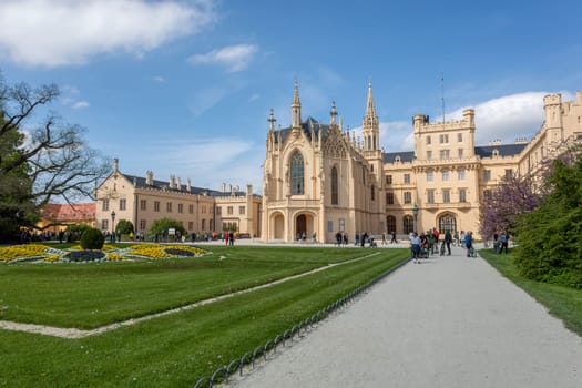 LEDNICE,CZECH REPUBLIC - May 7th, 2023: Chateau Lednice with beautiful gardens with flowers and parks on sunny summer day. Lednice-Valtice landmark, South Moravian region. UNESCO World Heritage Site.