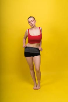 Fashion portrait of young beautiful woman with big breasts. Carefree model in lingerie.