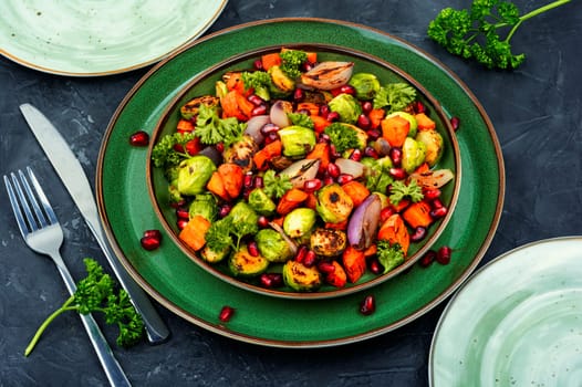 Bright dietary vegetable salad of cabbage, herbs and physalis. Healthy eating