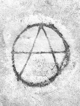 Symbol of anarchy painted on the wall. Graffiti.