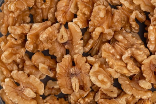 Closeup of big shelled walnuts pile
