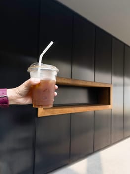 A glass of iced black orange coffee, stock photo