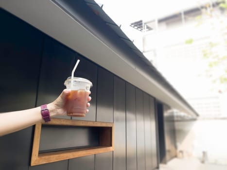 A glass of iced black orange coffee, stock photo