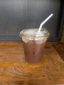 A glass of iced black orange coffee, stock photo