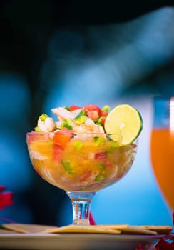 Nicaraguan food, shrimp ceviche with fruit cocktail drink, Nicaraguan palate
