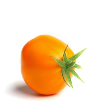 orange tomato isolated on white