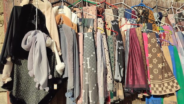 Scarves hanging display. fashion clothing store products shop sale shopping High quality photo