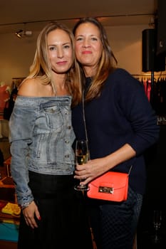 Kathrin Bruss (owner) and Dana Schweiger at Petra Teufel Fashion Night 2015