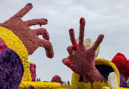 Noordwijk, Netherlands - April 22, 2023: Spectacular flower covered floats in the Bloemencorso Bollenstreek the annual spring flower parade from Noordwijk to Haarlem in the Netherlands.