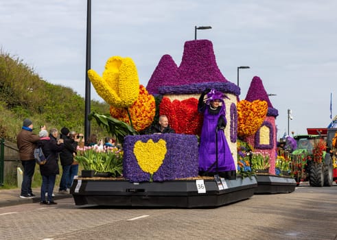 Noordwijk, Netherlands - April 22, 2023: Spectacular flower covered floats in the Bloemencorso Bollenstreek the annual spring flower parade from Noordwijk to Haarlem in the Netherlands.