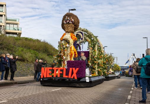Noordwijk, Netherlands - April 22, 2023: Spectacular flower covered floats in the Bloemencorso Bollenstreek the annual spring flower parade from Noordwijk to Haarlem in the Netherlands.