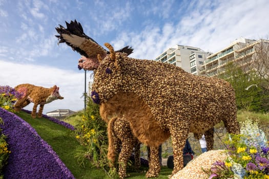 Noordwijk, Netherlands - April 22, 2023: Spectacular flower covered floats in the Bloemencorso Bollenstreek the annual spring flower parade from Noordwijk to Haarlem in the Netherlands.