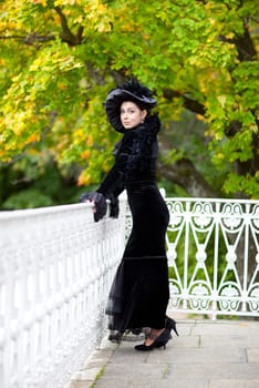 beautiful aristocratic woman near palace