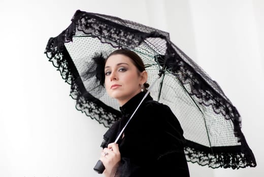 beautiful aristocratic woman near palace