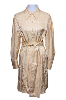 Party dress isolated. Closeup of a beautiful silver gold woman girl dress on mannequin isolated on white. Clipping path. Festive elegant evening dress.