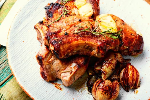 Delicious meat steak in the Christmas table. Meat dish and Christmas decorations.