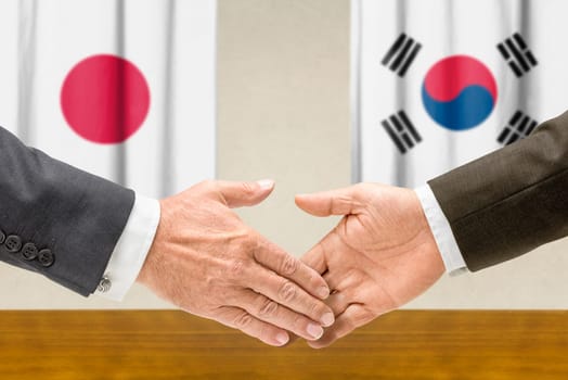 Representatives of Japan and South Korea reach out