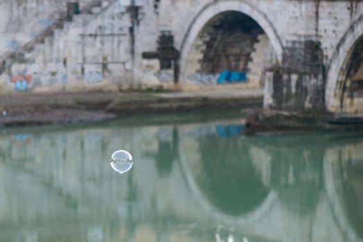 bridge on tevere river in rome near vatican