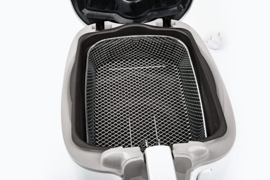 Basket from Air Fryer isolated on white background