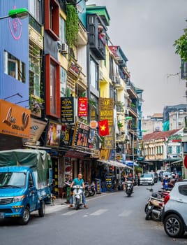 Hanoi, Vietnam, November 15, 2022: Busy steet scene in French Quarter of Hanoi.