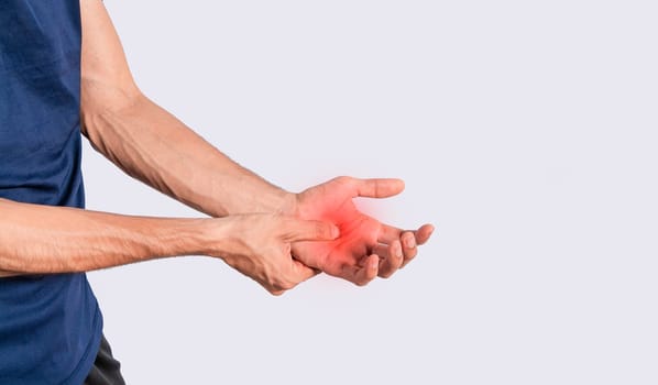 Person with palm pain, concept of a man with pain in the hands, man with arthritis rubbing, person with pain in the hands