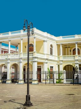 A lantern pole in a square with copy space, An illuminated lantern pole, Public lantern pole, Public lighting pole