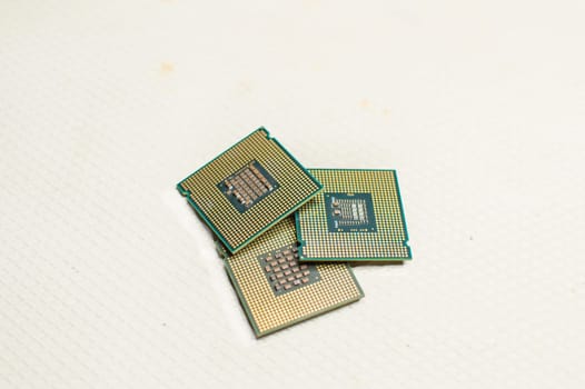 isolated computer microprocessors, three computer processors with one computer motherboard, computer processor concept