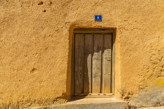 Mazarife, Castile and Leon, Spain: 12 August 2022: Villar de Mazarife famous old door, province Leon, Spain. Camino de Santiago.