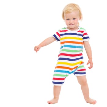 Full length portrait of cheerful baby in swimsuit
