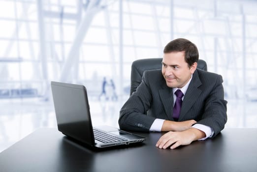 business man working with is laptop, at the office