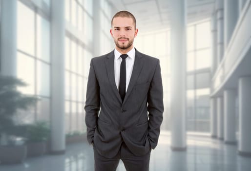 young business man portrait at the office
