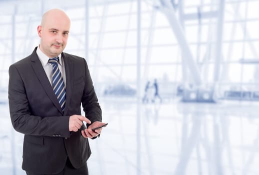 young businessman working on the phone, at the office