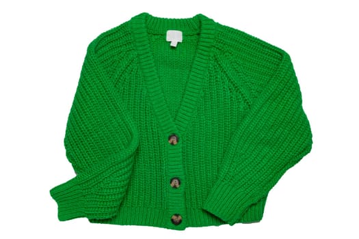Casual elegant fluffy long-sleeved cardigan with V-neck and button closure isolated on a white background. Womens green sweater or jumper. Autumn and winter fashion.