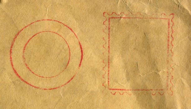 front view extreme closeup of craft antique brown paper with empty old imprints of postal stamp seals in red color ink