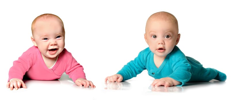 Six month old twin brother and sister on white
