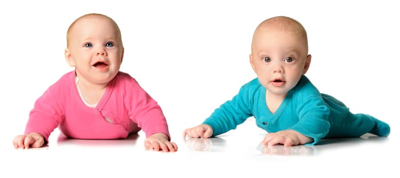 Six month old twin brother and sister on white