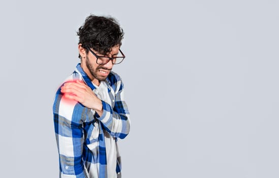 Man with upper arm muscle pain, Man suffering from upper arm inflammation. Arm and shoulder pain concept. People with upper arm pain isolated, muscle tension problems