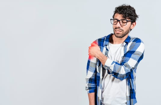 People with upper arm pain isolated, Man with upper arm muscle pain, Man suffering from upper arm inflammation. Arm and shoulder pain concept. muscle tension problems