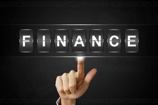 business hand pushing finance on Flipboard Display