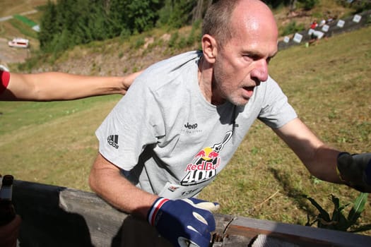This runner hangs on the gang at the . Red Bull 400 - Germany premiere Titisee-Neustadt up the slope....
