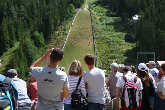 . Numerous spectators watch the German premiere of the Schanzensprint at the large Hochfirschanze in Titisee-Neustadt. .. Red Bull 400 - Germany premiere Titisee-Neustadt